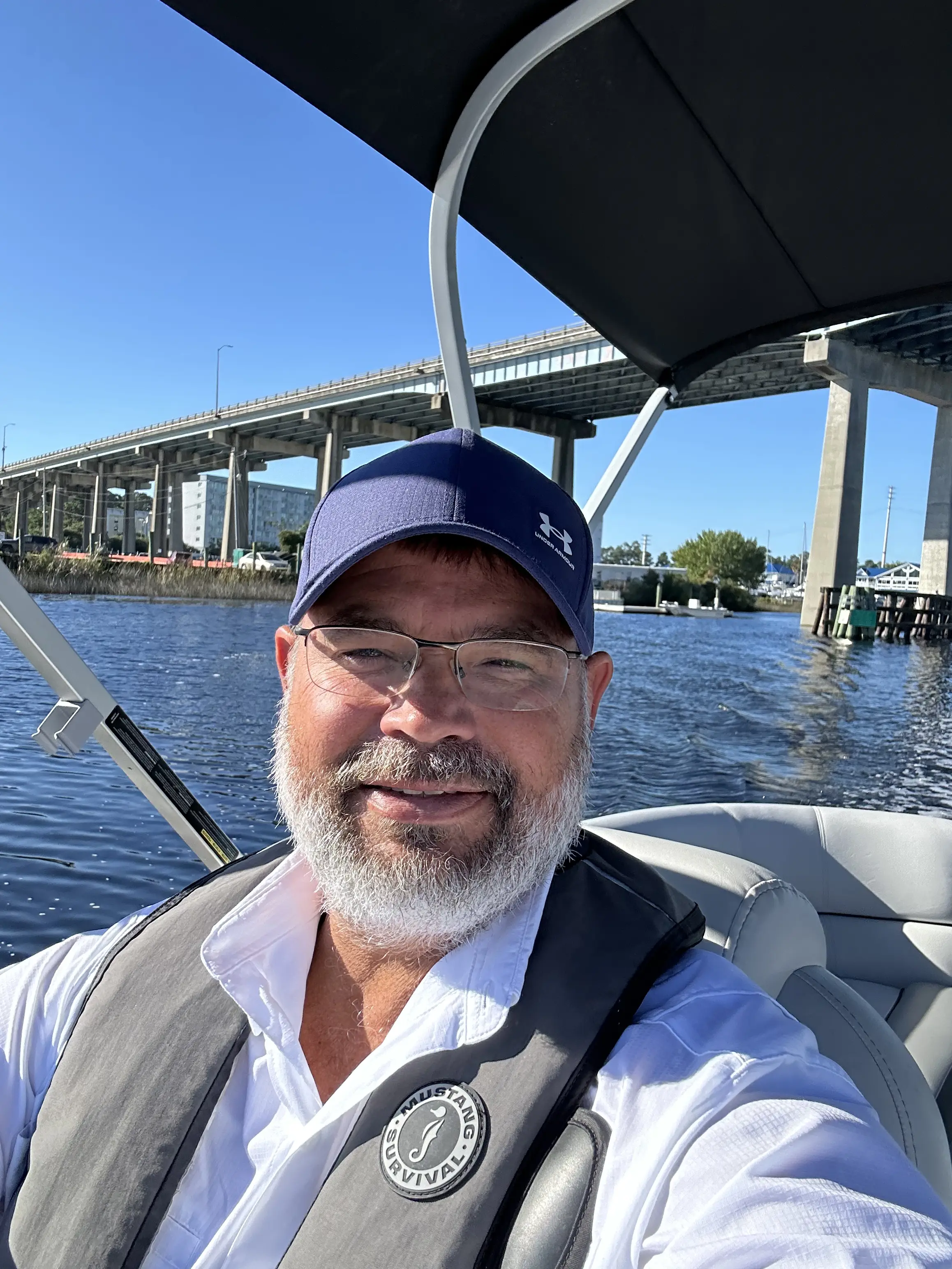Man smiling on a boat ride