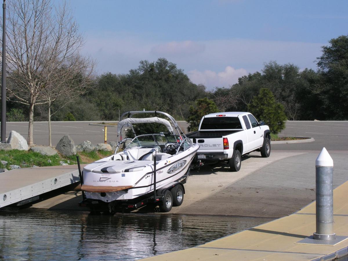 Truck launching boat into the water