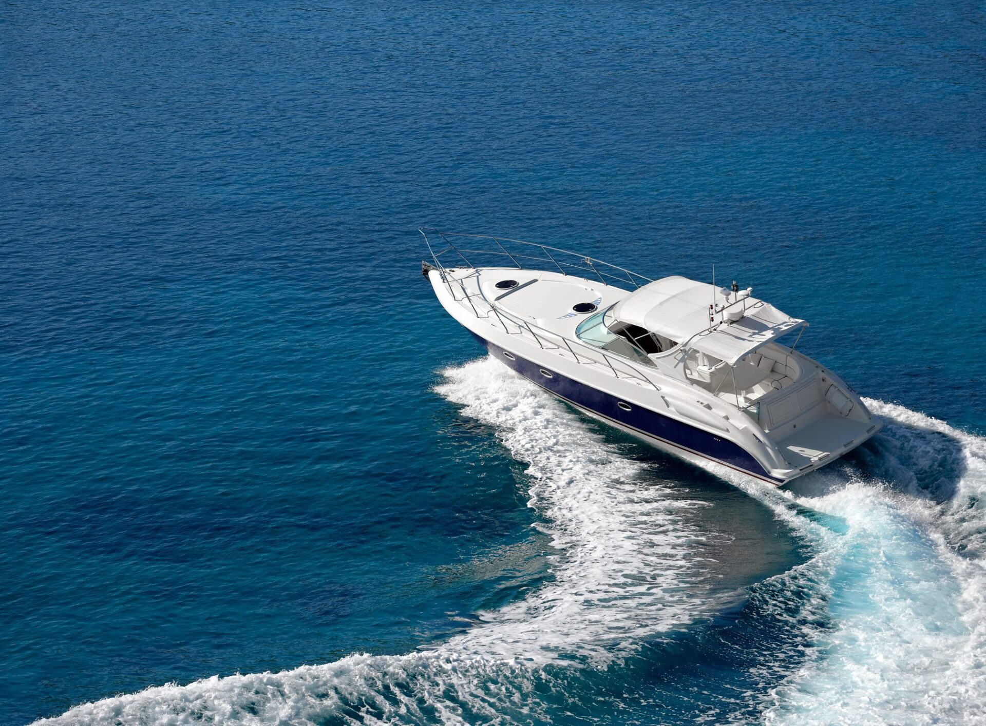 Luxury yacht cruising on blue ocean
