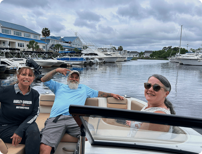People enjoying a boat ride at marina