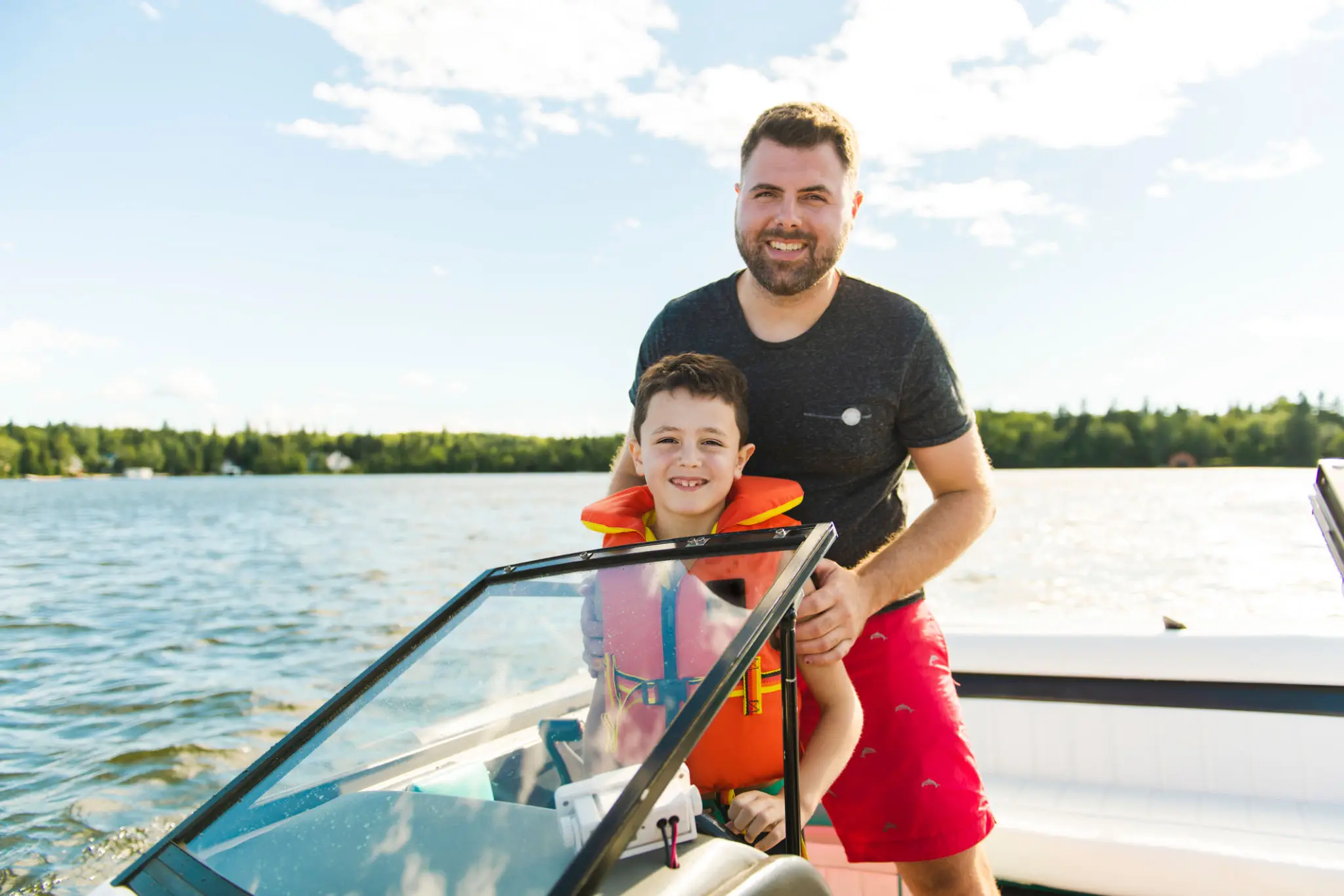 Father and son on the boat