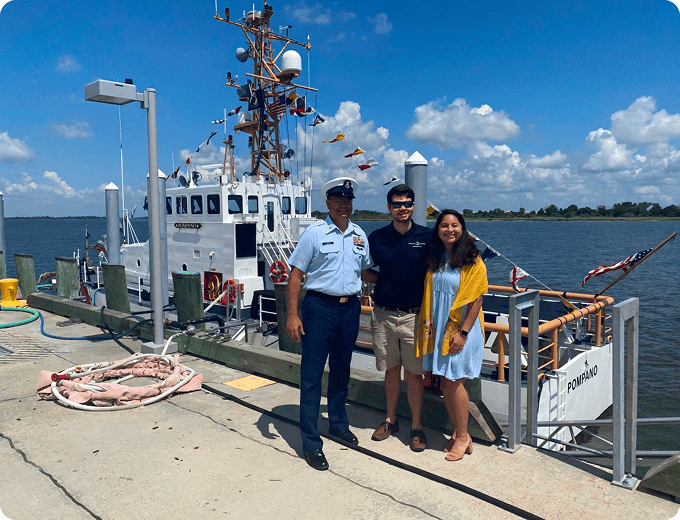 Group photo with coast guard vessel